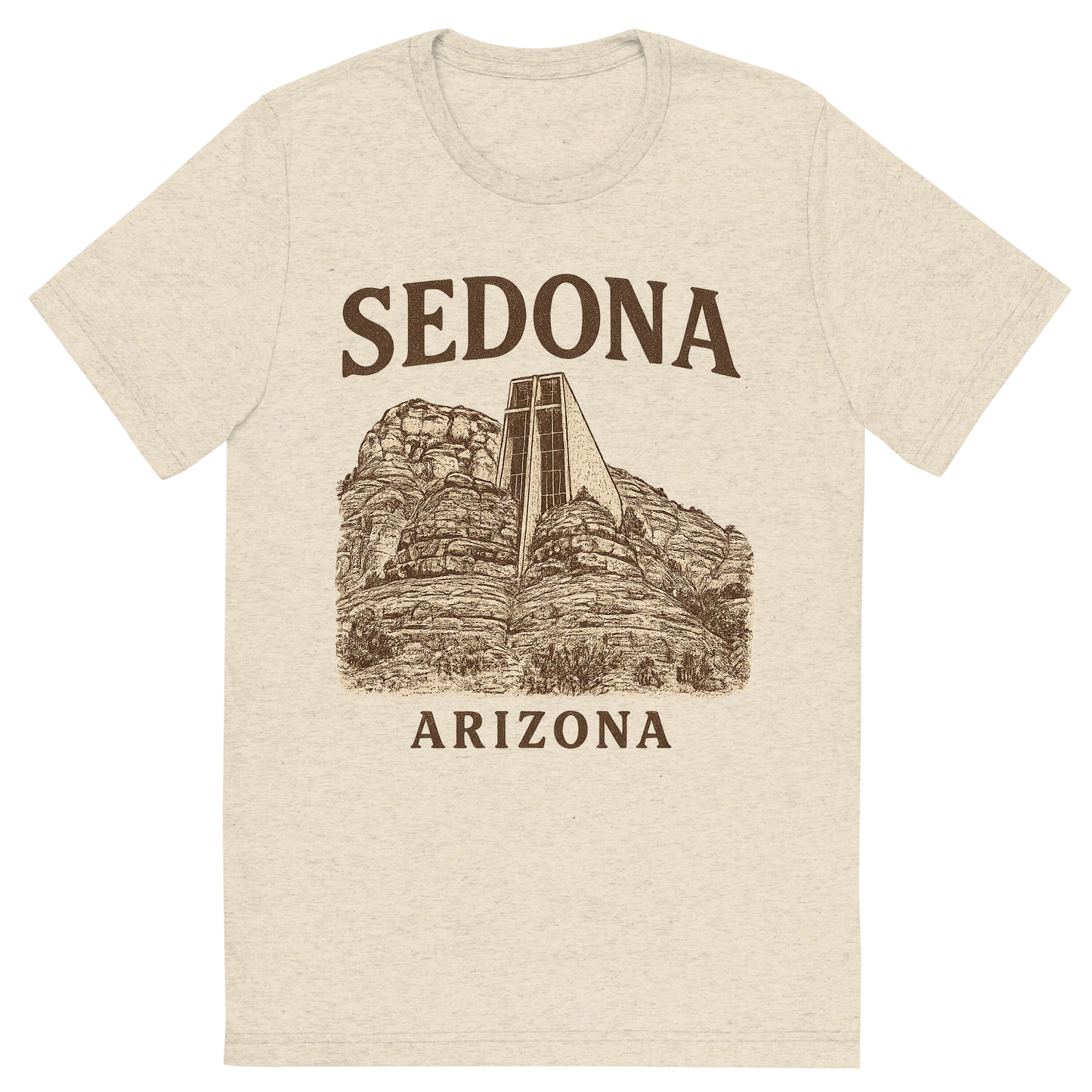 Front view of a Premium Tri-Blend Crew Neck T-Shirt in Oatmeal showing 'A typographic, nostalgic graphic of a typographic illustration of the words 'sedona, arizona' with a vintage line art drawing of the chapel of the holy cross'