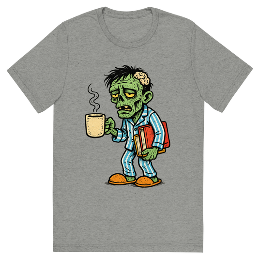 Front view of a Premium Tri-Blend Crew Neck T-Shirt in Athletic Grey showing 'A hand-drawn ink with pop color, comedic graphic of a hand-drawn ink and color illustration of a tired student zombie in pajamas holding a coffee mug and schoolbooks, with the phrase “team no sleep” in stylized lettering above. transparent background, centered composition, optimized for dtg printing.'
