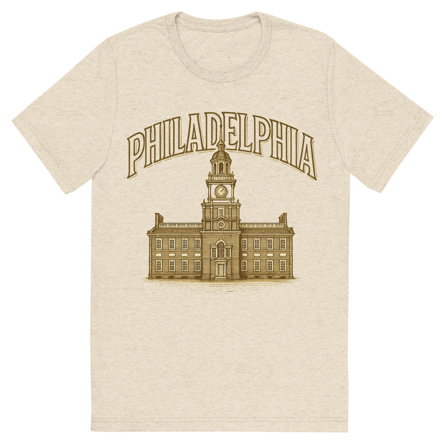 Front view of a Premium Tri-Blend Crew Neck T-Shirt in Oatmeal showing 'A typographic, nostalgic graphic of a typographic illustration of the words 'philadelphia' with a vintage line art drawing of independence hall'