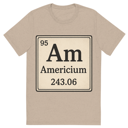 Front view of a Premium Tri-Blend Crew Neck T-Shirt in Tan showing 'A line art, nostalgic graphic of americium's entry on the periodic table, use a dark color for the lines and text'