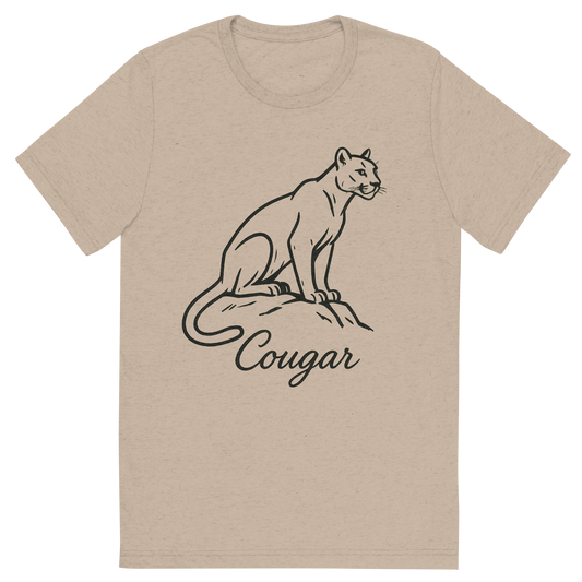 Front view of a Premium Tri-Blend Crew Neck T-Shirt in Tan showing 'A flat, neutral graphic of a minimalist sketch of a cougar perched with alert posture. “cougar” appears in elegant cursive beneath. ink on white.'
