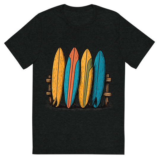 Front view of a Premium Tri-Blend Crew Neck T-Shirt in Charcoal-Black showing 'A hand-drawn ink with pops of color, playful graphic of a stylized stack of colorful vintage surfboards leaning against a wooden fence, hand-drawn ink with pops of color, centered composition, transparent background, optimized for dtg printing'