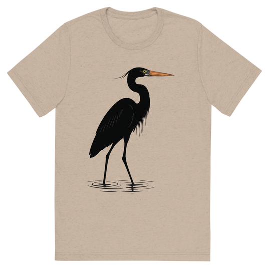 Front view of a Premium Tri-Blend Crew Neck T-Shirt in Tan showing 'A high-contrast silhouette with minimal accent color, graceful graphic of a tall silhouette of a great blue heron wading in shallow water, with subtle color on the beak and eye, long legs and neck featured, transparent background, optimized for dtg printing'