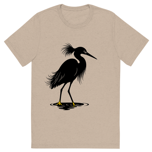 Front view of a Premium Tri-Blend Crew Neck T-Shirt in Tan showing 'A high-contrast silhouette with minimal accent color, elegant graphic of a high-contrast silhouette of a snowy egret with plume feathers and slender black bill, yellow feet highlighted in color, standing in water, transparent background, optimized for dtg printing'