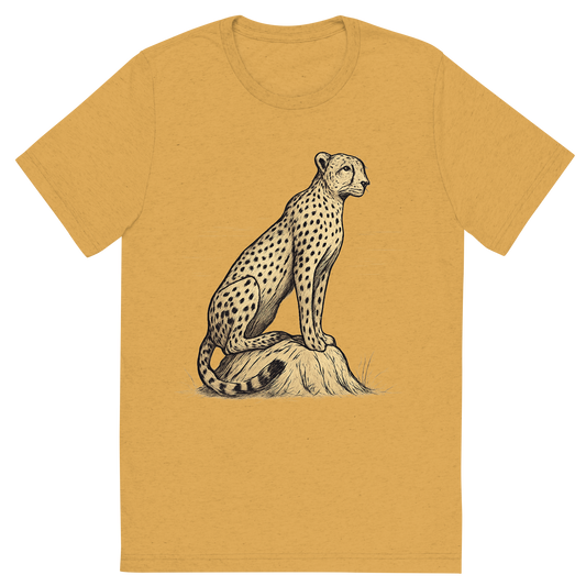 Front view of a Premium Tri-Blend Crew Neck T-Shirt in Mustard showing 'A hand-drawn ink with color pops, focused graphic of a sleek cheetah perched atop a termite mound, scanning the horizon with alert eyes, illustrated in hand-drawn ink with soft tan and black details, centered composition, transparent background, optimized for dtg printing'
