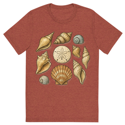 Front view of a Premium Tri-Blend Crew Neck T-Shirt in Clay showing 'A hand-drawn ink with pops of color, natural graphic of a hand-drawn collection of various seashells (conch, scallop, spiral, sand dollar) arranged artistically, ink with pops of color, square layout, transparent background, optimized for dtg printing'