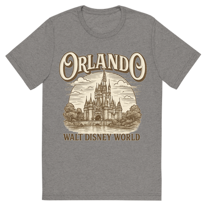 Front view of a Premium Tri-Blend Crew Neck T-Shirt in Grey showing 'A typographic, nostalgic graphic of a typographic illustration of the words 'orlando' with a vintage line art drawing of the walt disney world'