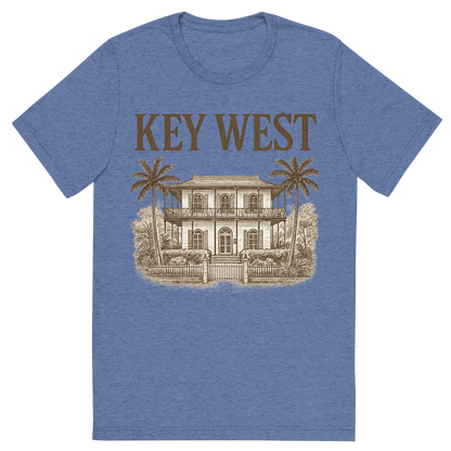 Front view of a Premium Tri-Blend Crew Neck T-Shirt in Blue showing 'A typographic, nostalgic graphic of a typographic illustration of the words 'key west' with a vintage line art drawing of the ernest hemingway home'