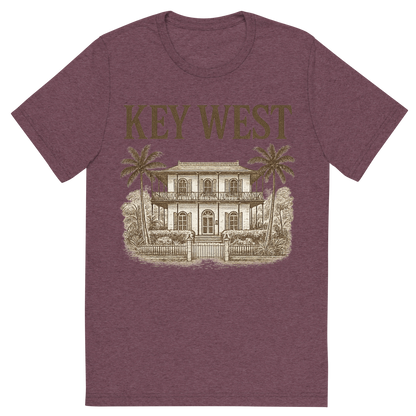 Front view of a Premium Tri-Blend Crew Neck T-Shirt in Maroon showing 'A typographic, nostalgic graphic of a typographic illustration of the words 'key west' with a vintage line art drawing of the ernest hemingway home'