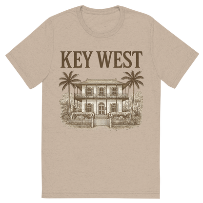 Front view of a Premium Tri-Blend Crew Neck T-Shirt in Tan showing 'A typographic, nostalgic graphic of a typographic illustration of the words 'key west' with a vintage line art drawing of the ernest hemingway home'