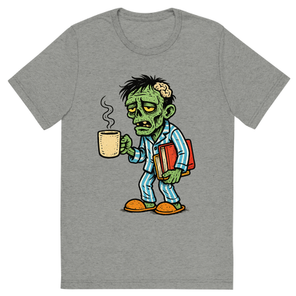 Front view of a Premium Tri-Blend Crew Neck T-Shirt in Athletic Grey showing 'A hand-drawn ink with pop color, comedic graphic of a hand-drawn ink and color illustration of a tired student zombie in pajamas holding a coffee mug and schoolbooks, with the phrase “team no sleep” in stylized lettering above. transparent background, centered composition, optimized for dtg printing.'