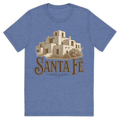 Front view of a Premium Tri-Blend Crew Neck T-Shirt in Blue showing 'A typographic, nostalgic graphic of a typographic illustration of the words 'santa fe' with a vintage line art drawing of the adobe architecture'