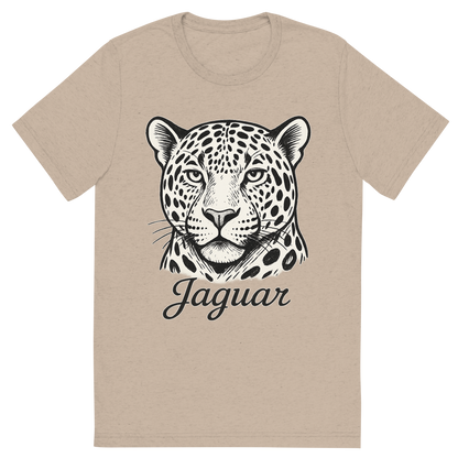 Front view of a Premium Tri-Blend Crew Neck T-Shirt in Tan showing 'A flat, neutral graphic of a bold sketch of a jaguar with large rosettes and strong jawline. “jaguar” appears in elegant script below. white background, fine linework.'