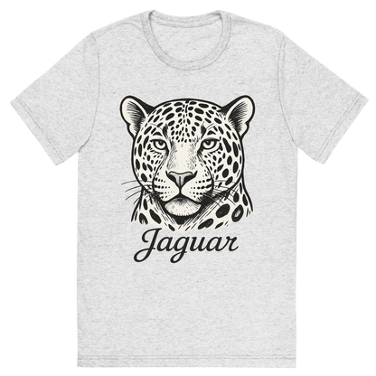 Front view of a Premium Tri-Blend Crew Neck T-Shirt in White Fleck showing 'A flat, neutral graphic of a bold sketch of a jaguar with large rosettes and strong jawline. “jaguar” appears in elegant script below. white background, fine linework.'