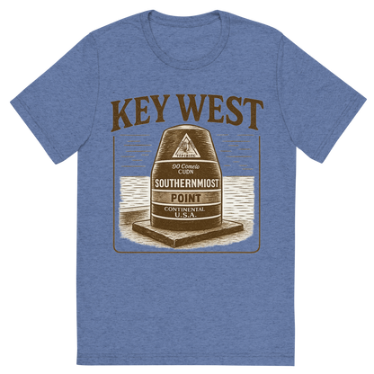 Front view of a Premium Tri-Blend Crew Neck T-Shirt in Blue showing 'A typographic, nostalgic graphic of a typographic illustration of the words 'key west' with a vintage line art drawing of the southernmost point buoy'
