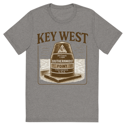 Front view of a Premium Tri-Blend Crew Neck T-Shirt in Grey showing 'A typographic, nostalgic graphic of a typographic illustration of the words 'key west' with a vintage line art drawing of the southernmost point buoy'