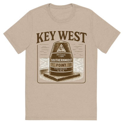 Front view of a Premium Tri-Blend Crew Neck T-Shirt in Tan showing 'A typographic, nostalgic graphic of a typographic illustration of the words 'key west' with a vintage line art drawing of the southernmost point buoy'