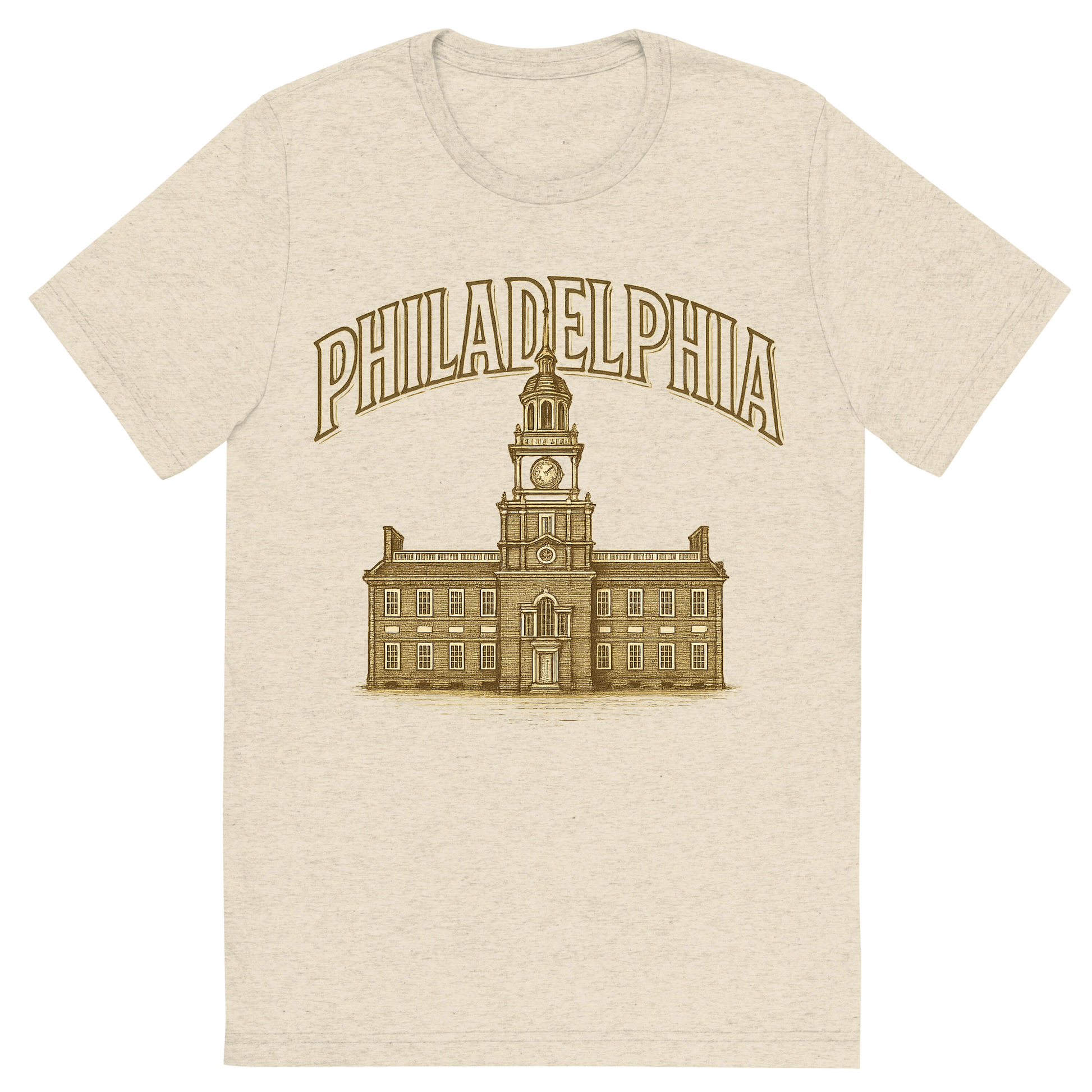 Front view of a Premium Tri-Blend Crew Neck T-Shirt in Oatmeal showing 'A typographic, nostalgic graphic of a typographic illustration of the words 'philadelphia' with a vintage line art drawing of independence hall'
