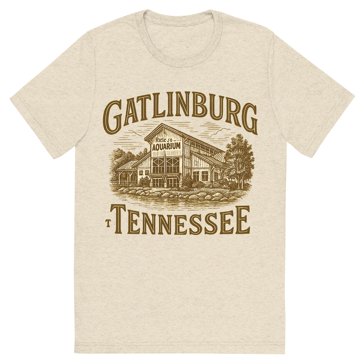 Front view of a Premium Tri-Blend Crew Neck T-Shirt in Oatmeal showing 'A typographic, nostalgic graphic of a typographic illustration of the words 'gatlinburg, tennessee' with a vintage line art drawing of ripley’s aquarium'