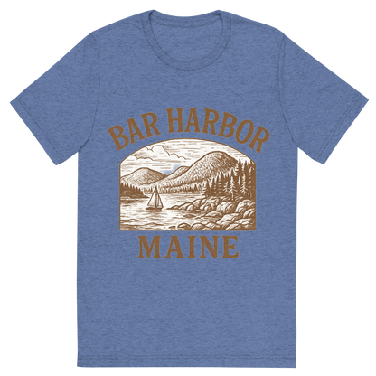 Front view of a Premium Tri-Blend Crew Neck T-Shirt in Blue showing 'A typographic, nostalgic graphic of a typographic illustration of the words 'bar harbor, maine' with a vintage line art drawing of acadia national park'