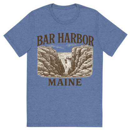 Front view of a Premium Tri-Blend Crew Neck T-Shirt in Blue showing 'A typographic, nostalgic graphic of a typographic illustration of the words 'bar harbor, maine' with a vintage line art drawing of thunder hole'