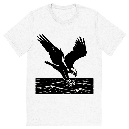 Front view of a Premium Tri-Blend Crew Neck T-Shirt in Solid White showing 'A high-contrast silhouette with minimal accent color, powerful graphic of a high-contrast silhouette of an osprey diving with talons extended over the ocean, wings outstretched in dynamic pose, accented with white head markings, transparent background, optimized for dtg printing'