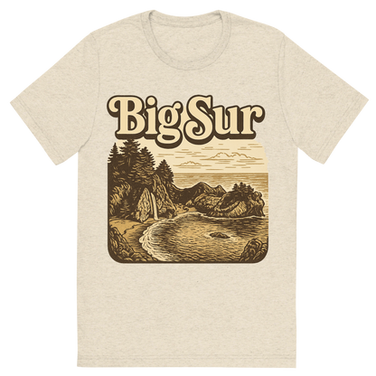 Front view of a Premium Tri-Blend Crew Neck T-Shirt in Oatmeal showing 'A typographic, nostalgic graphic of a typographic illustration of the words 'big sur' with a vintage line art drawing of the mcway falls'