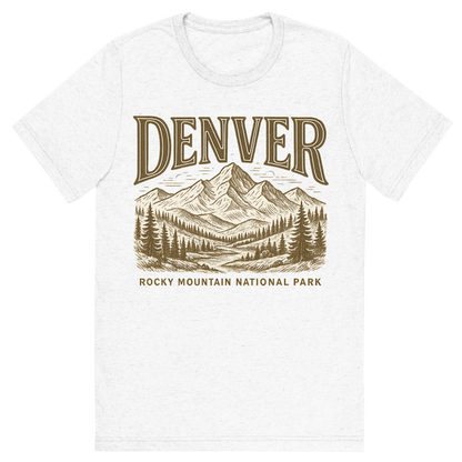 Front view of a Premium Tri-Blend Crew Neck T-Shirt in Solid White showing 'A typographic, nostalgic graphic of a typographic illustration of the words 'denver' with a vintage line art drawing of the rocky mountain national park'