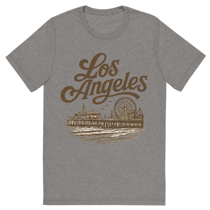 Front view of a Premium Tri-Blend Crew Neck T-Shirt in Grey showing 'A typographic, nostalgic graphic of a typographic illustration of the words 'los angeles' with a vintage line art drawing of santa monica pier'