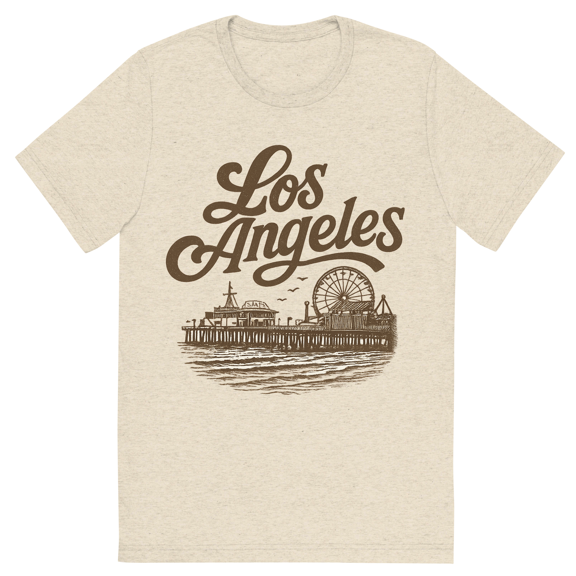 Front view of a Premium Tri-Blend Crew Neck T-Shirt in Oatmeal showing 'A typographic, nostalgic graphic of a typographic illustration of the words 'los angeles' with a vintage line art drawing of santa monica pier'