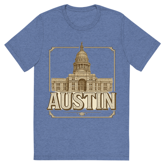 Front view of a Premium Tri-Blend Crew Neck T-Shirt in Blue showing 'A typographic, nostalgic graphic of a typographic illustration of the words 'austin' with a vintage line art drawing of the texas state capitol'