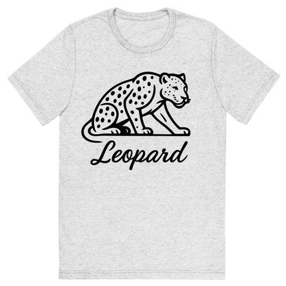 Front view of a Premium Tri-Blend Crew Neck T-Shirt in White Fleck showing 'A flat, neutral graphic of a minimalist drawing of a leopard crouched, with visible spots and muscular build. “leopard” is written beneath in flowing script. black ink on white.'