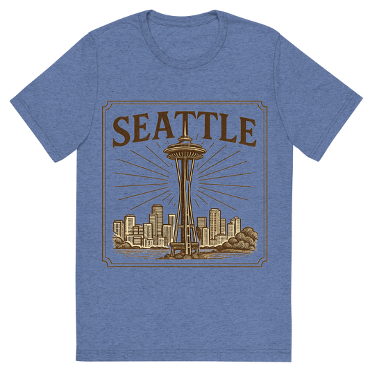 Front view of a Premium Tri-Blend Crew Neck T-Shirt in Blue showing 'A typographic, nostalgic graphic of a typographic illustration of the words 'seattle' with a vintage line art drawing of the space needle'