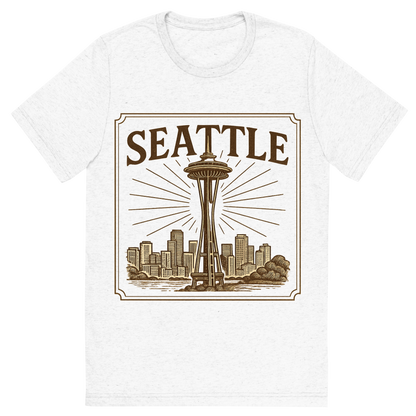 Front view of a Premium Tri-Blend Crew Neck T-Shirt in Solid White showing 'A typographic, nostalgic graphic of a typographic illustration of the words 'seattle' with a vintage line art drawing of the space needle'
