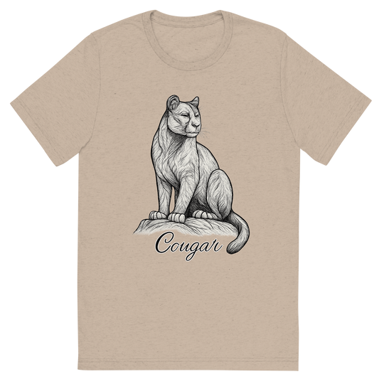 Front view of a Premium Tri-Blend Crew Neck T-Shirt in Tan showing 'A flat, neutral graphic of a  sketch of a cougar perched with alert posture. “cougar” appears in elegant cursive beneath. detailed ink illustration on a white background.'