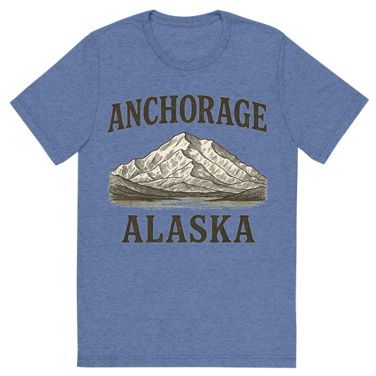 Front view of a Premium Tri-Blend Crew Neck T-Shirt in Blue showing 'A typographic, nostalgic graphic of a typographic illustration of the words 'anchorage, alaska' with a vintage line art drawing of denali'