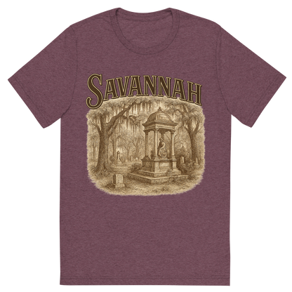 Front view of a Premium Tri-Blend Crew Neck T-Shirt in Maroon showing 'A typographic, nostalgic graphic of a typographic illustration of the words 'savannah' with a vintage line art drawing of the bonaventure cemetery'