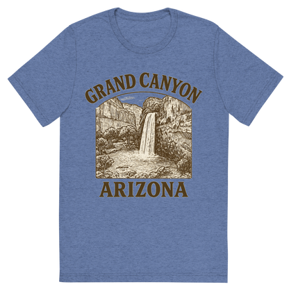 Front view of a Premium Tri-Blend Crew Neck T-Shirt in Blue showing 'A typographic, nostalgic graphic of a typographic illustration of the words 'grand canyon, arizona' with a vintage line art drawing of the havasu falls'