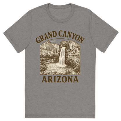 Front view of a Premium Tri-Blend Crew Neck T-Shirt in Grey showing 'A typographic, nostalgic graphic of a typographic illustration of the words 'grand canyon, arizona' with a vintage line art drawing of the havasu falls'