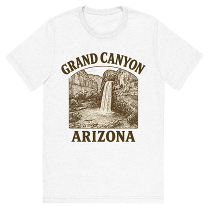 Front view of a Premium Tri-Blend Crew Neck T-Shirt in Solid White showing 'A typographic, nostalgic graphic of a typographic illustration of the words 'grand canyon, arizona' with a vintage line art drawing of the havasu falls'