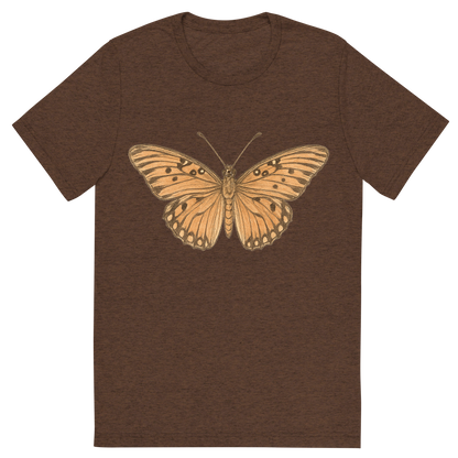 Front view of a Premium Tri-Blend Crew Neck T-Shirt in Brown showing 'A hand-drawn, tranquil graphic of gulf fritillary butterfly'