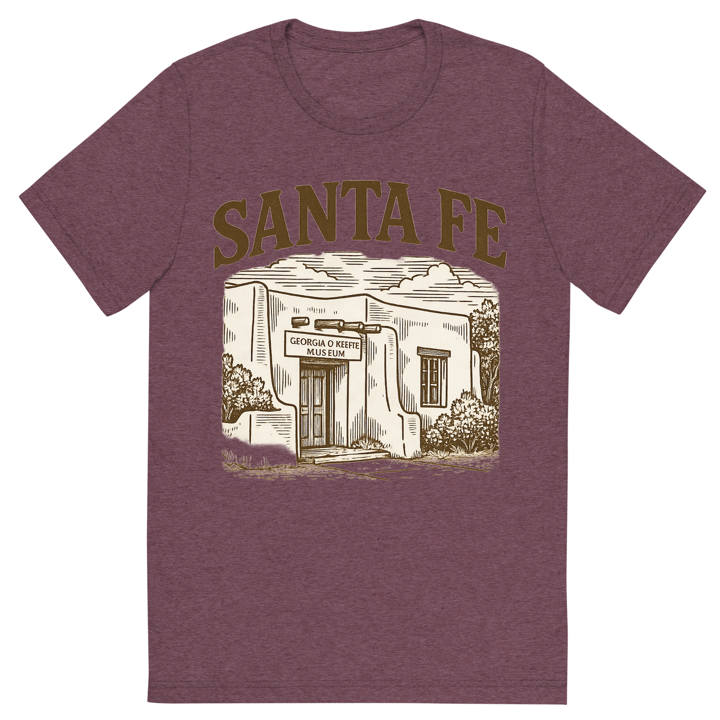 Front view of a Premium Tri-Blend Crew Neck T-Shirt in Maroon showing 'A typographic, nostalgic graphic of a typographic illustration of the words 'santa fe' with a vintage line art drawing of the georgia o’keeffe museum'