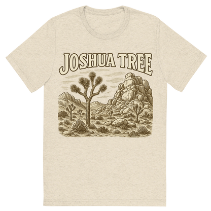 Front view of a Premium Tri-Blend Crew Neck T-Shirt in Oatmeal showing 'A typographic, nostalgic graphic of a typographic illustration of the words 'joshua tree' with a vintage line art drawing of the hidden valley'