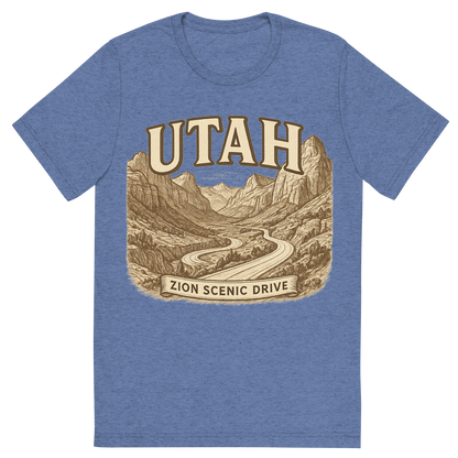 Front view of a Premium Tri-Blend Crew Neck T-Shirt in Blue showing 'A typographic, nostalgic graphic of a typographic illustration of the words 'utah' with a vintage line art drawing of the zion scenic drive'