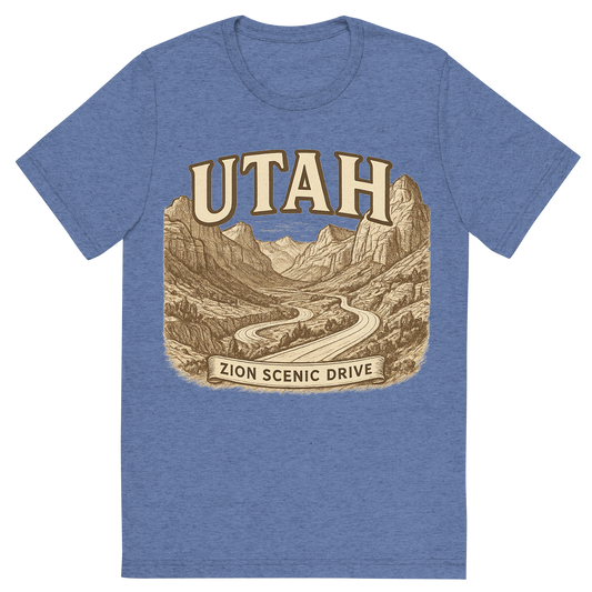 Front view of a Premium Tri-Blend Crew Neck T-Shirt in Blue showing 'A typographic, nostalgic graphic of a typographic illustration of the words 'utah' with a vintage line art drawing of the zion scenic drive'