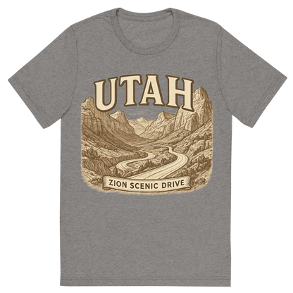 Front view of a Premium Tri-Blend Crew Neck T-Shirt in Grey showing 'A typographic, nostalgic graphic of a typographic illustration of the words 'utah' with a vintage line art drawing of the zion scenic drive'