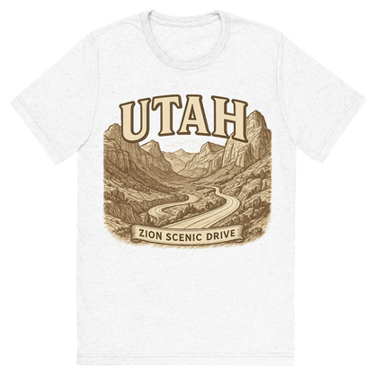 Front view of a Premium Tri-Blend Crew Neck T-Shirt in Solid White showing 'A typographic, nostalgic graphic of a typographic illustration of the words 'utah' with a vintage line art drawing of the zion scenic drive'