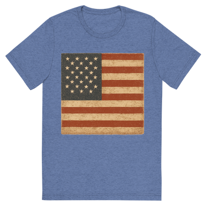 Front view of a Premium Tri-Blend Crew Neck T-Shirt in Blue showing 'A retro, rustic graphic of a stylized version of the american flag'