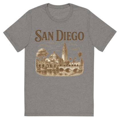 Front view of a Premium Tri-Blend Crew Neck T-Shirt in Grey showing 'A typographic, nostalgic graphic of a typographic illustration of the words 'san diego' with a vintage line art drawing of balboa park'