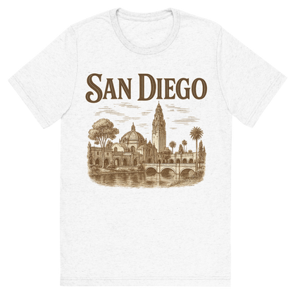 Front view of a Premium Tri-Blend Crew Neck T-Shirt in Solid White showing 'A typographic, nostalgic graphic of a typographic illustration of the words 'san diego' with a vintage line art drawing of balboa park'